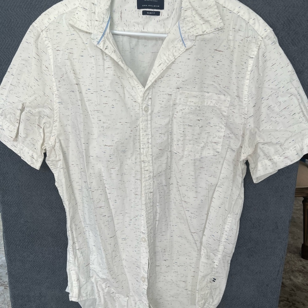 White short sleeved button up shirt